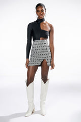 READ BETWEEN THE LINES HIGH RISE MINI SKIRT